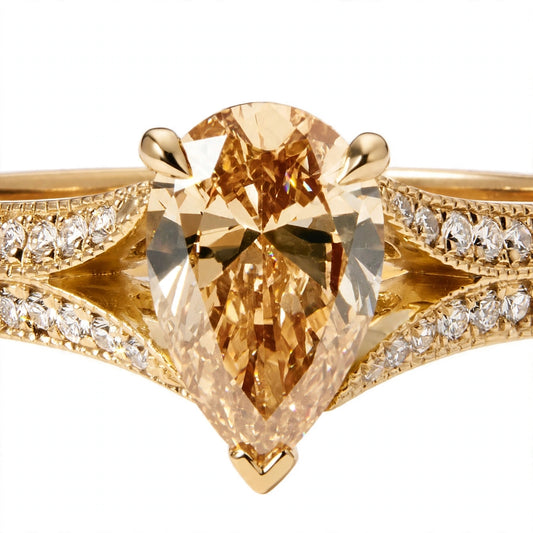Vintage-Inspired Pear-Cut Champagne Diamond Engagement Ring with Pave Split-Shank Accent Bands.