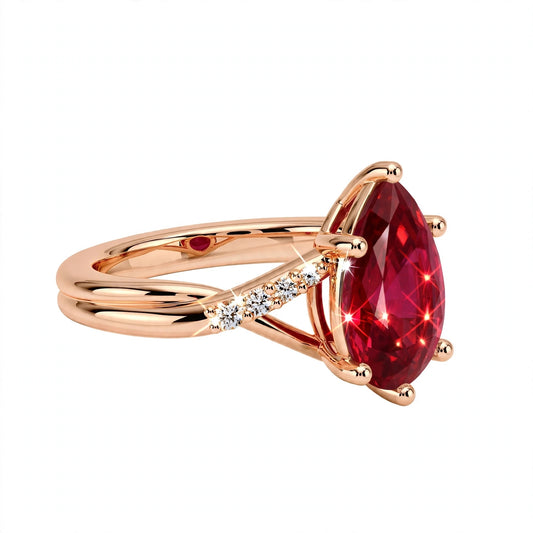 Pear-cut ruby solitaire engagement ring.