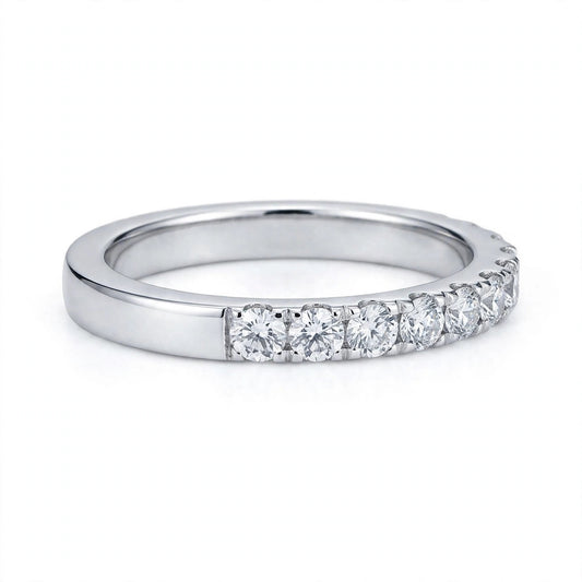 Half-eternity diamond ring set in a highly polished white sterling silver.