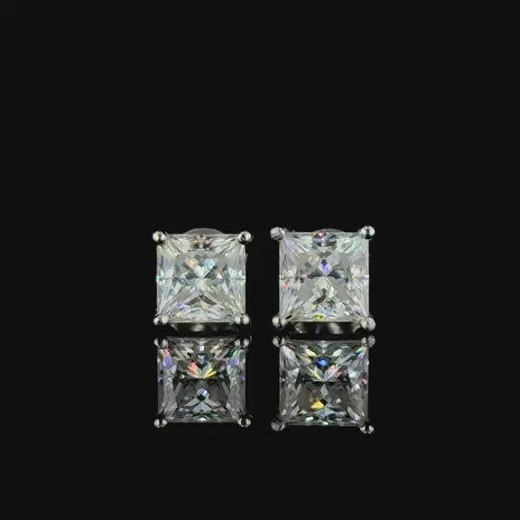 Classic princess-cut diamond stud earrings.