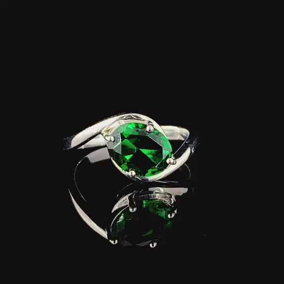 Silver Designer Ring With A Green Diamond