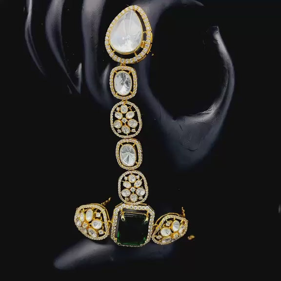 Gold-plated uncut emerald-green center stone hand harness.