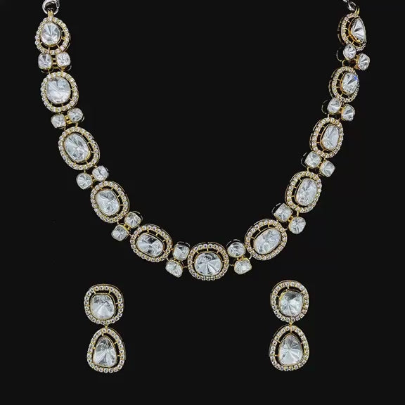 Gold-plated Polki Kundan-studded jewelry set.