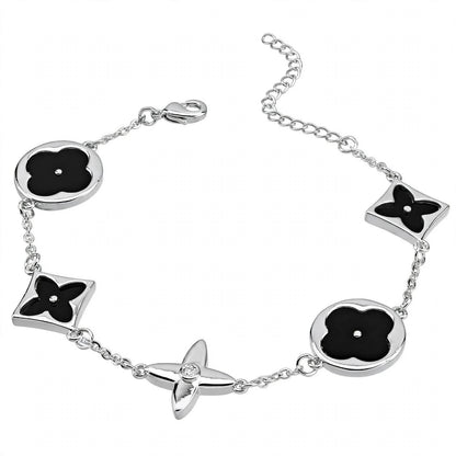 14K Rose Gold Mixed Motif Black Enamel Charm Bracelet.