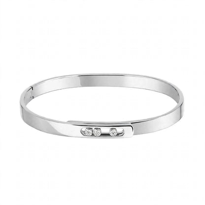 18K Yellow Gold Three-Stone Moving Diamond Bangle
