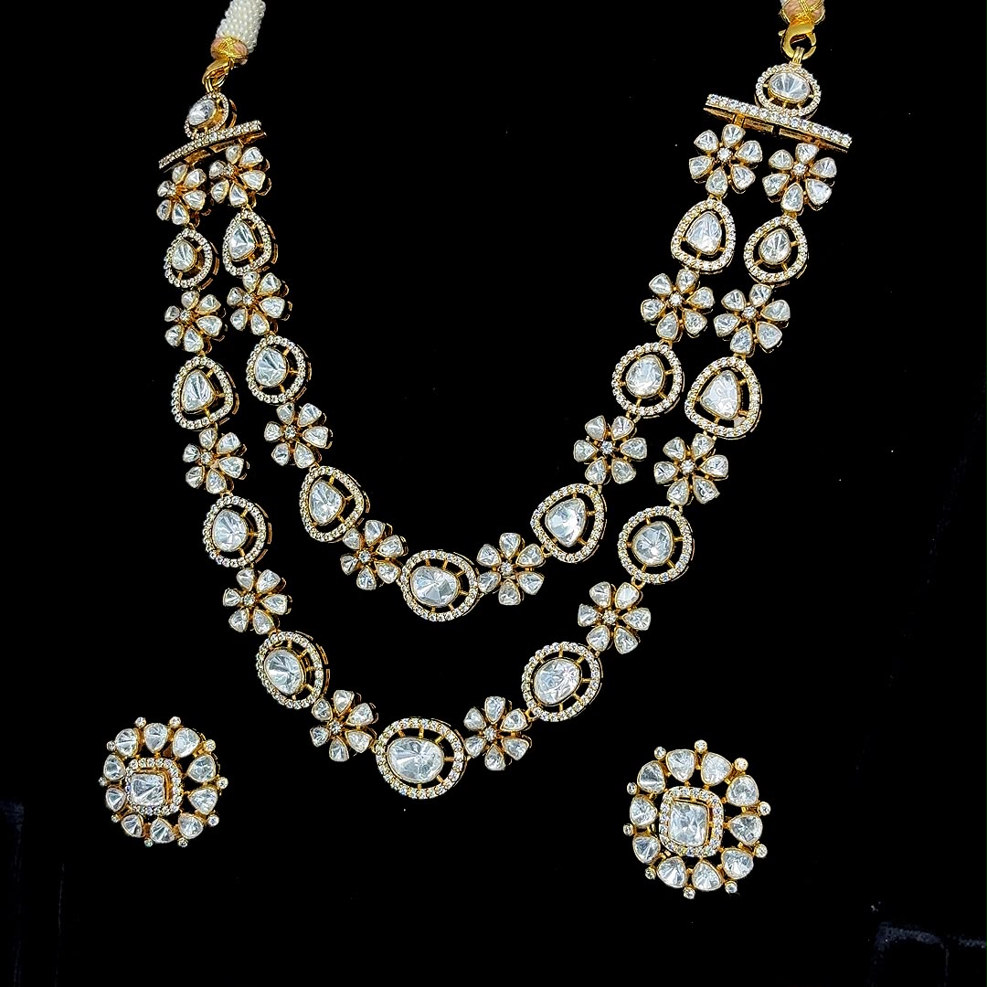 Gold-plated double-layered Polki and Kundan-style stone necklace set.