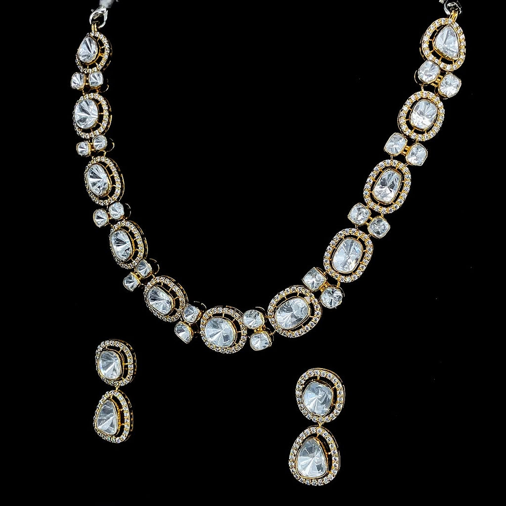Gold-plated Polki Kundan-studded jewelry set.