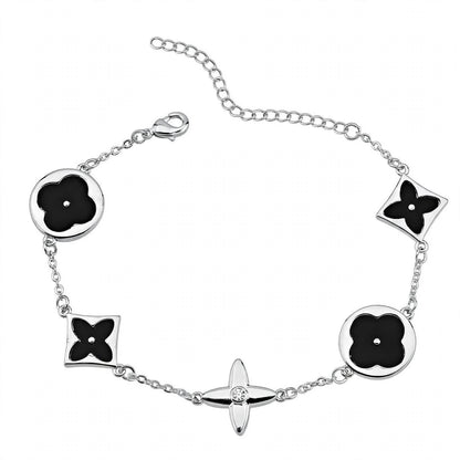 14K Rose Gold Mixed Motif Black Enamel Charm Bracelet.