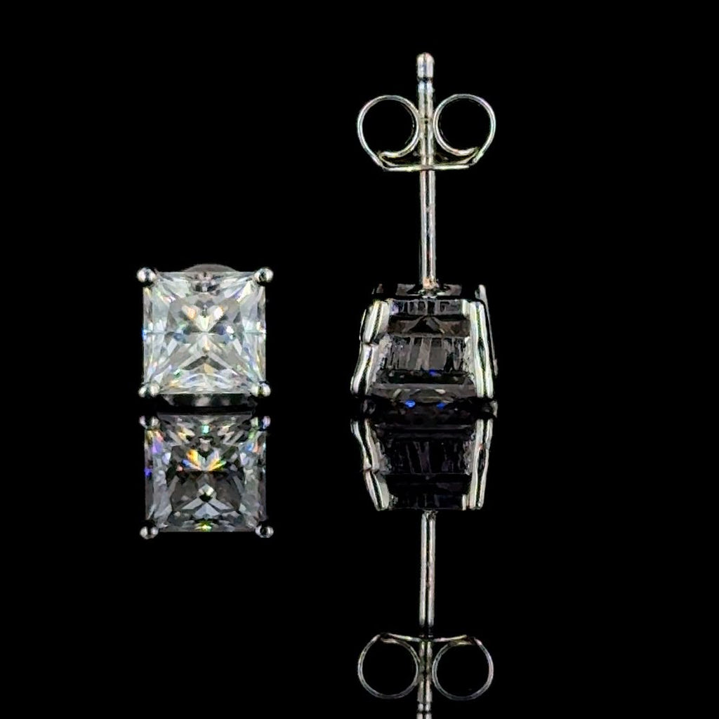 Classic princess-cut diamond stud earrings.