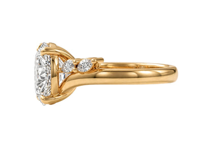 14K Yellow Gold Nature-Inspired Round Cut Solitaire Engagement Ring with Marquise Diamond Accents.