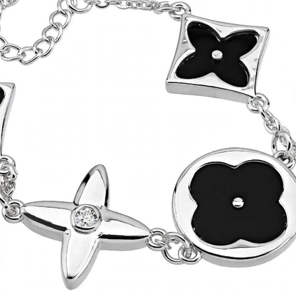 14K Rose Gold Mixed Motif Black Enamel Charm Bracelet.