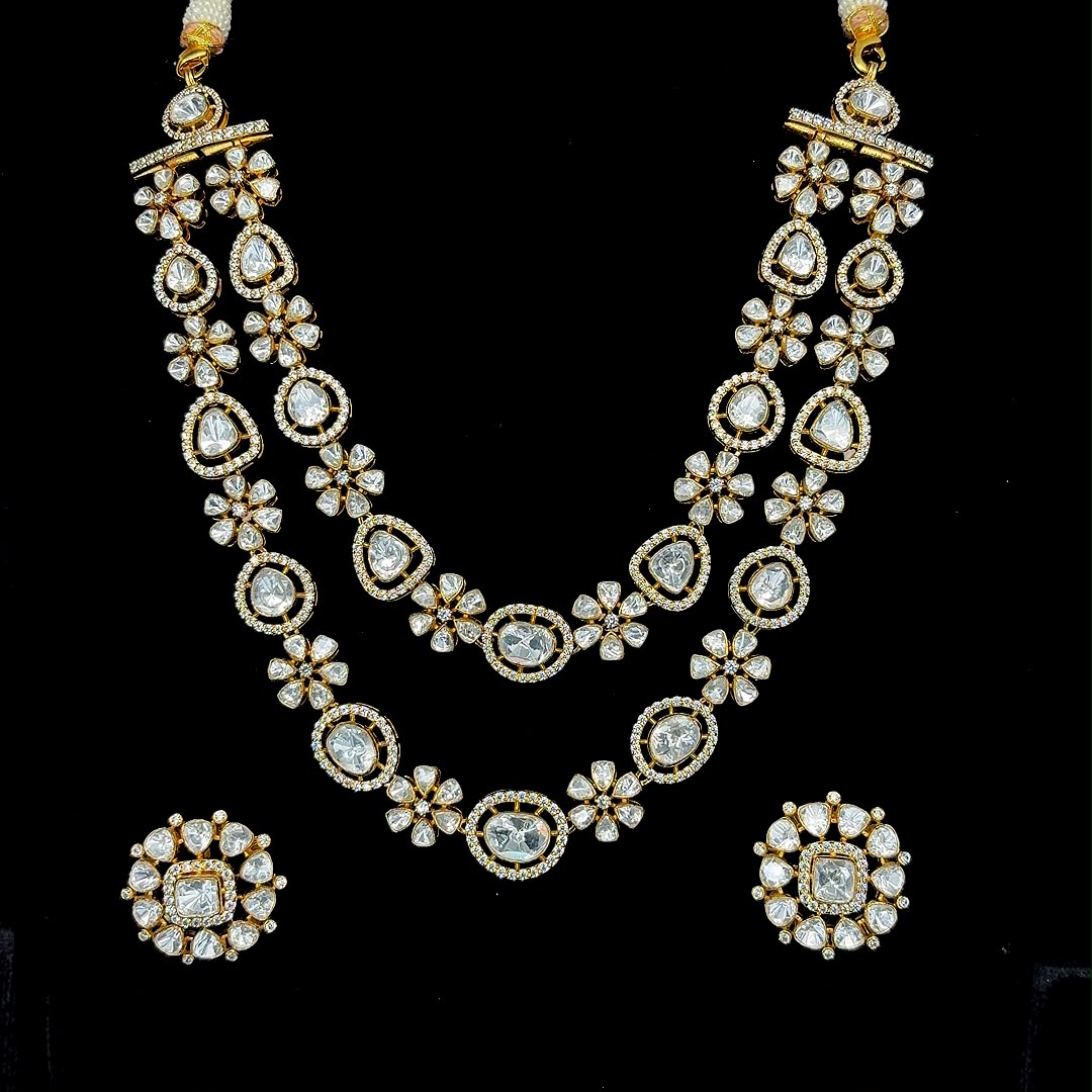 Gold-plated double-layered Polki and Kundan-style stone necklace set.