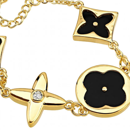 14K Rose Gold Mixed Motif Black Enamel Charm Bracelet.