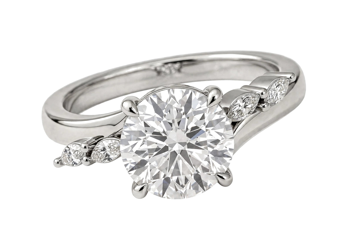 14K Yellow Gold Nature-Inspired Round Cut Solitaire Engagement Ring with Marquise Diamond Accents.