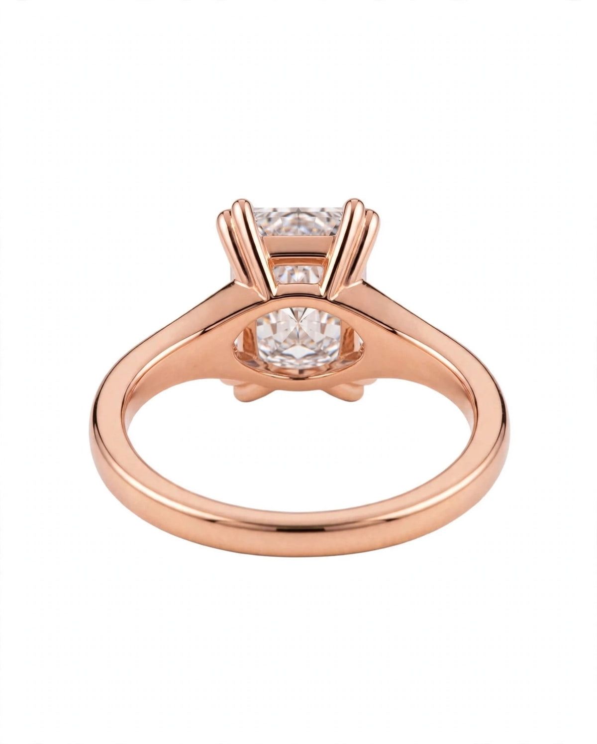 Radiant-cut engagement ring with cluster side stones.