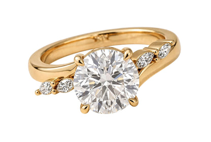 14K Yellow Gold Nature-Inspired Round Cut Solitaire Engagement Ring with Marquise Diamond Accents.