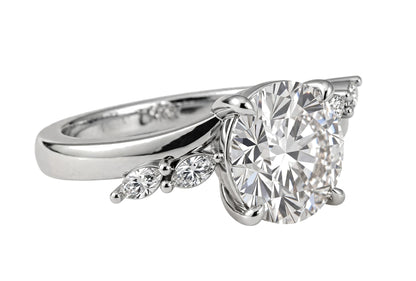 14K Yellow Gold Nature-Inspired Round Cut Solitaire Engagement Ring with Marquise Diamond Accents.