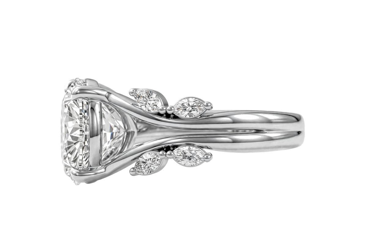 14K Yellow Gold Nature-Inspired Round Cut Solitaire Engagement Ring with Marquise Diamond Accents.