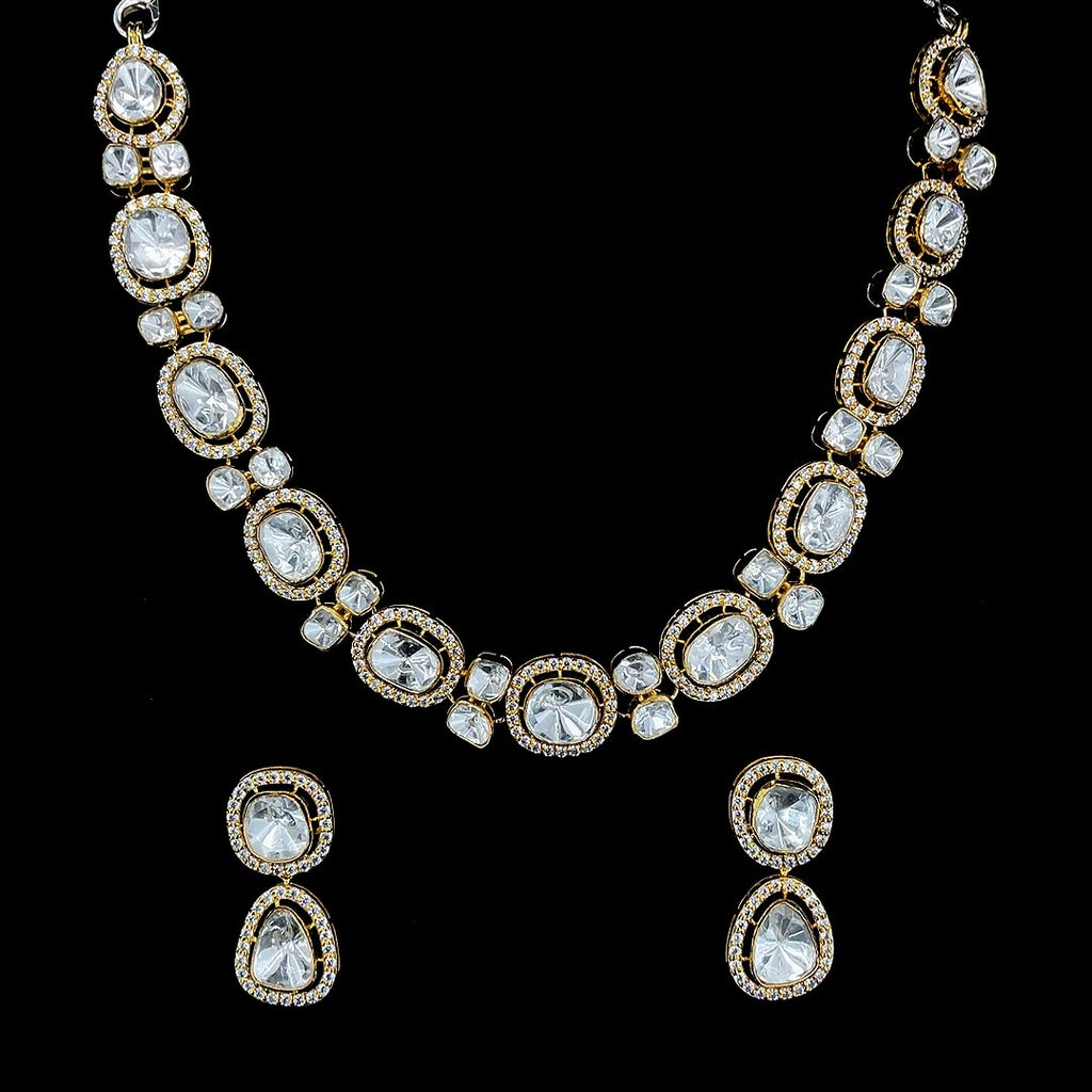 Gold-plated Polki Kundan-studded jewelry set.