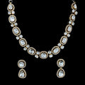 Gold-plated Polki Kundan-studded jewelry set.