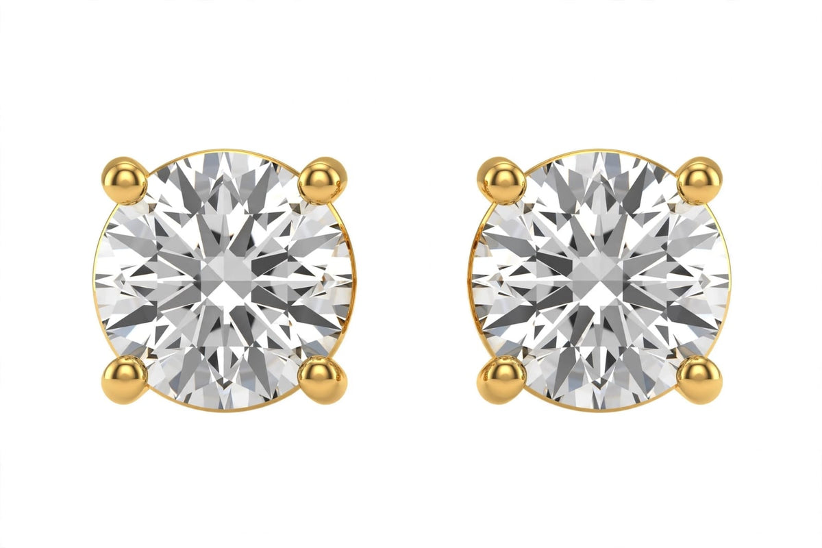 Round brilliant cut diamond stud earrings.