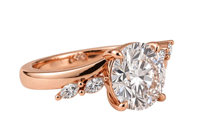 14K Yellow Gold Nature-Inspired Round Cut Solitaire Engagement Ring with Marquise Diamond Accents.
