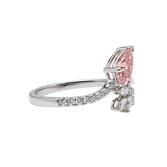 Pear-cut pink lab-grown diamond leaf-style engagement ring.