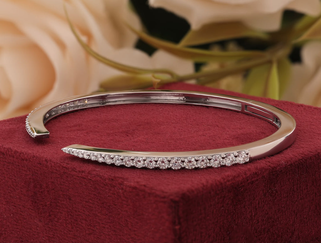 Round-cut white zirconia crystals open cuff bangle.