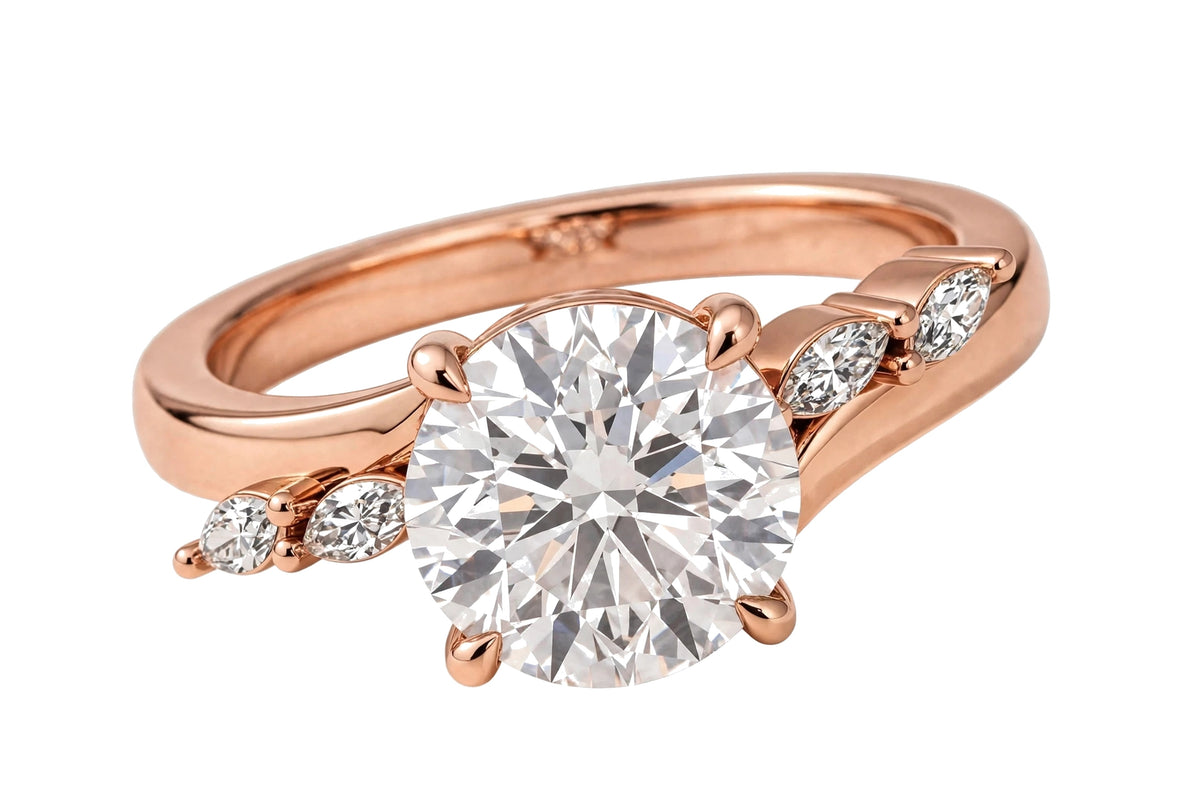 14K Yellow Gold Nature-Inspired Round Cut Solitaire Engagement Ring with Marquise Diamond Accents.